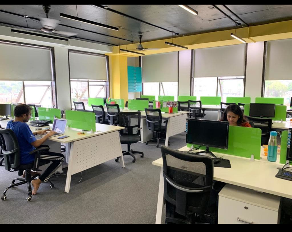 The co-working hall, with the team at their desks